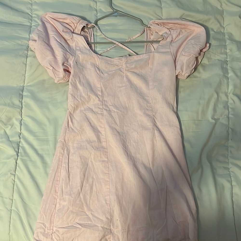 Medium, pink soft-core dress, with back open.